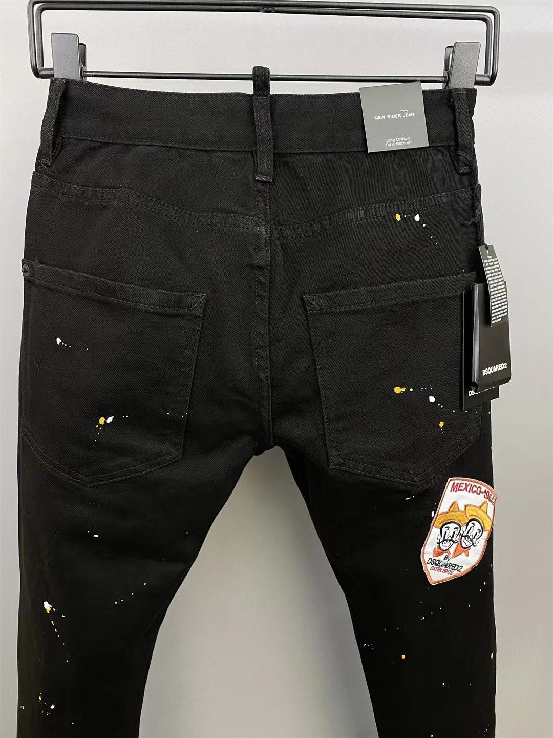 New-DSQ2 Black Badge Distressed Slim Fit Jeans