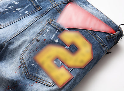 New-DSQ2 Frayed patch Jeans